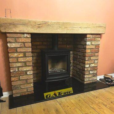 Stovax Chesterfield 5 Wide with polished black granite hearth installation