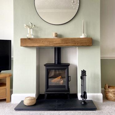 Stovax Sheraton 5 with rustic wooden beam and slate hearth